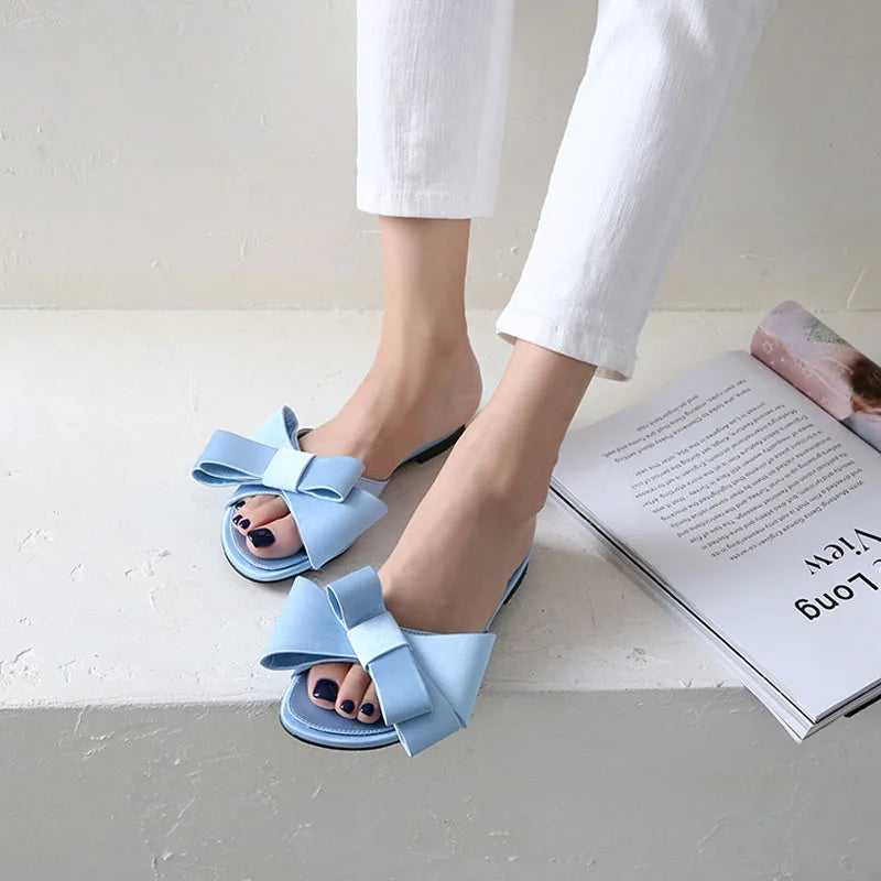 Futurecen Wearing flat slippers women's shoes Korean version of the summer new large bow satin round head sandals Wild half slippers