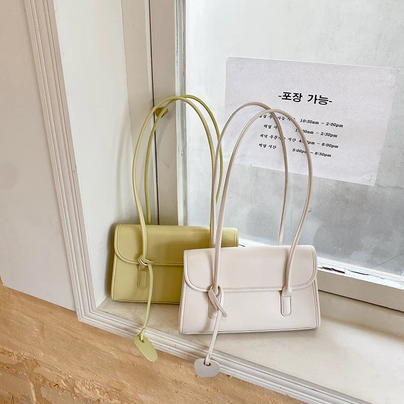 Futurecen  -  Yellow Shoulder Underarm Bag Women Spring/Summer New Fashionable French Texture PU Shoulder Bag  Elegant pendants Handbag